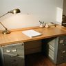 My First Desk Was a Hollow-Core Door on Filing Cabinets — And It Taught Me More Than Any $3,000 Setup